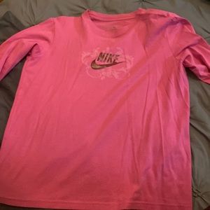 Long sleeve Nike shirt.
